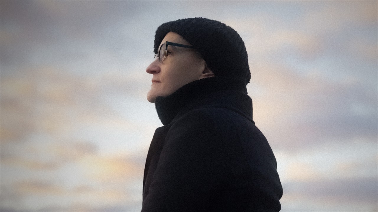 Close up of a woman with glasses